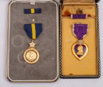 A USA Purple Heart in case of issue,