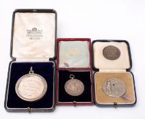 A silver Fordyce Academy For French medallion in box and three others (4)