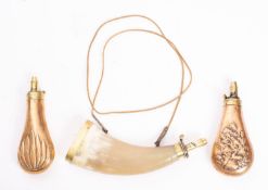 A brass mounted horn powder flask, unsigned 27cm long,