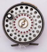 A Hardy 'Zenith' 3 inch alloy fly reel stamped as per title with single ebonised handle,