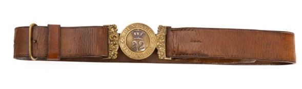 An Indian Army 22nd Punjab Infantry waist belt clasp on brown leather belt.