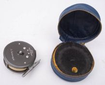 A Hardy 'Featherweight' 2 7/8 inch fly reel, single ebonised handle,