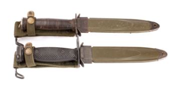 Two US M4 pattern fighting knives, one with rectangular hilt and wooden grip,