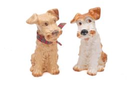 Two large Sylvac Pottery Terrier dogs, model 1380, one in a matt finish the other in a glass finish,