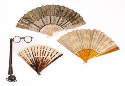A late nineteenth century mother of pearl and lace fan in a Selfridge box,