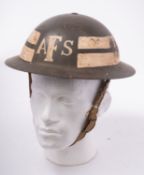 A WWII British Home Service Mk I steel helmet for the Auxiliary Fire Service: green with white