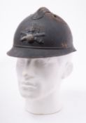 A WWI French Artillery M15 Adrian steel helmet of three piece construction with comb and 'RF'