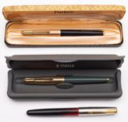 A Parker 51 'Custom' fountain pen, gilt cap over black barrel stamped as per title,