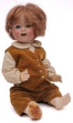 A Simon & Halbig bisque head doll, applied brown wig, blue glass sleeping eyes,