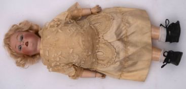 A Haubach Kopplesdorf bisque head doll, applied blond wig, blue glass sleeping eye,