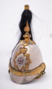 An Elizabeth II Lifeguards helmet,