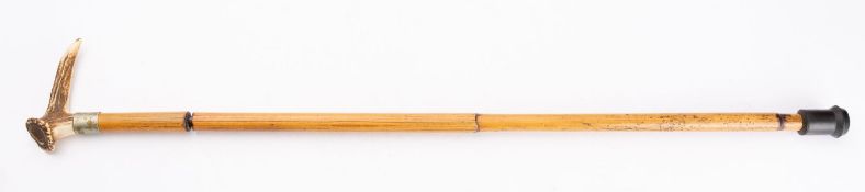 An early 20th century antler handled bamboo swordstick,
