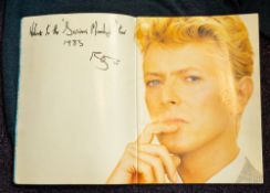David Bowie. A 1983 'Serious Moonlight' Tour programme and sweat shirt.