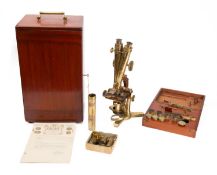 A late 19th century lacquered brass compound binocular microscope by R & J Beck,London,