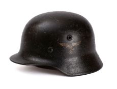 A WWII period Luftwaffe M42 pattern Stahlhelm, stamped '1420' to interior,