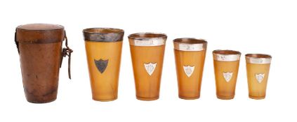 A late Victorian cased set of five silver mounted graduated horn hunting cups, maker Mappin & Webb,