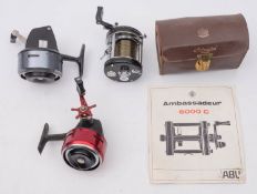 An Abu Ambassadeur 6000 C Multiplier reel in leather case with accessories and instruction booklet,