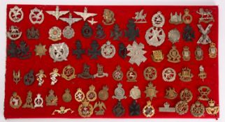 A collection of British Military cap badges including RAF and RFC, Parachute Regiment,