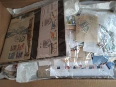 A box of stamps, including two stockbooks with ranges of GB Queen Victoria 1D Reds.