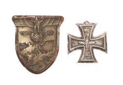 A WWII German Army/Waffen-SS Krim Campaign shield and a cast reproduction Iron Cross: