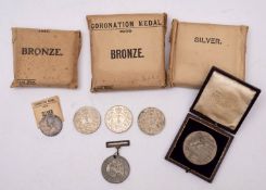 A Victorian Royal Mint 1897 Diamond Jubilee white metal medallion in case of issue and envelope