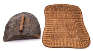 An elm fire cowl, possibly 18th century, of domed form with square section handle, 45cm x 41cm,