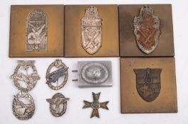 A group of four WWII German battle plaques comprising Narvik 1940, Demjansk 1942,