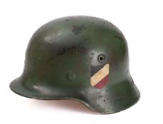 A WWII period M1942 pattern Youth's Stahlhelm green with National colours to one side and applied