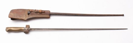 A WWI period French Label Model 1886 bayonet with steel scabbard and brown leather frog.