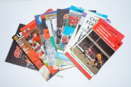 A collection of various football programs including England v Germany 12th March 1975 and others.