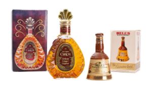 A boxed bottle of Canton Ginger Liqueur and a bottle of Bells Scotch Whisky (2).