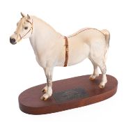 A Beswick Connoisseur model 'Champion' Welsh Mountain pony Gredington Simwnt 3614, on a wooden base,