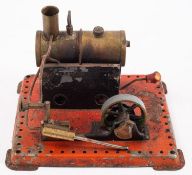 A Mamod live steam single piston stationary engine.