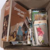 A collection of early 20th century and later postcards relating to birds,