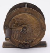 An early 20th century 2 1/4 inch brass three bar fly reel, maker J B Moscrop,