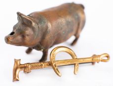 An early 20th century small brass pig vesta case, 5cm long,