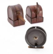 A Hardy 'Uniqua' aluminium fly reel, single black handle with brass foot,