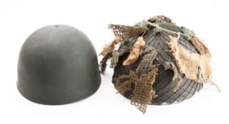 A post war British Army Airborne Division steel helmet by CWL size 7 3/8ths.