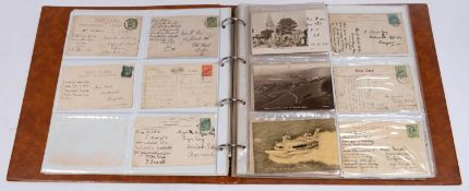 An album of early 20th century postal stationary and topographical postcards.