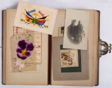 An Edwardian Carte de Visite album containing family portraits, various photographers,