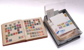 A collection of stamps and covers in seven albums and loose with mint blocks,