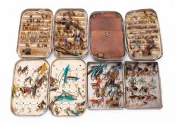 Two 'Unthank' aluminium fly tins and steel eye flies,