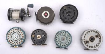 A group of seven various reels including a Twynham 4 inch alloy fly reel, an Allcock 3 inch reel,
