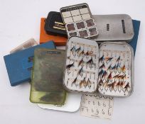 A collection of flies in four Wheatley aluminium fly tins,