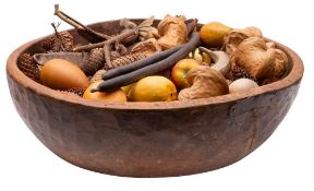A hardwood dairy bowl of large proportions, 19th century, of circular outline,