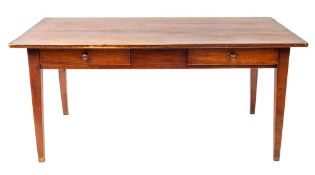 A French fruitwood kitchen table,