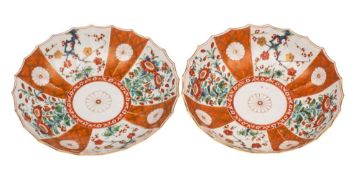 A pair of First Period Worcester fluted saucer dishes painted in the 'Scarlet Japan' pattern with