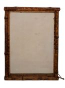 A bamboo framed rectangular wall mirror, possibly French,