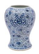 A Chinese blue and white yen yen vase [reduced] painted overall with a design of scrolling peony,