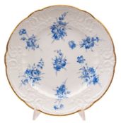 A Nantgarw dessert plate London decorated in blue monochrome with seven bunches of flowers,